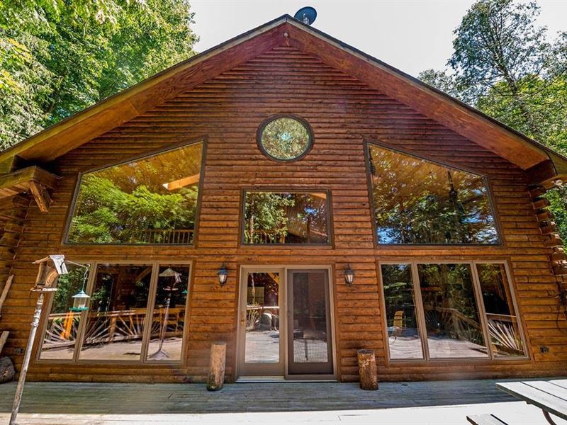 Captivating Log Home On River : Ludington : Mason County : Michigan