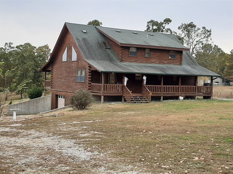 2 Story Log Home With Stocked Lake Lot for Sale in West Plains